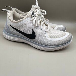 Woman's White Nike Shoes
